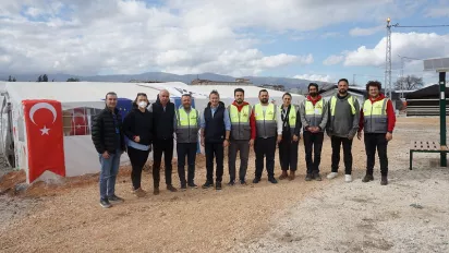 ILO response to the earthquakes in Türkiye, delegation visited visited the tent camp at Bozoklu .